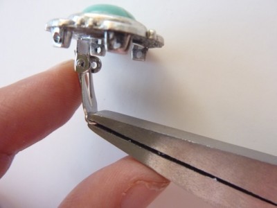 Step 2: Bend clip inward 90 degrees